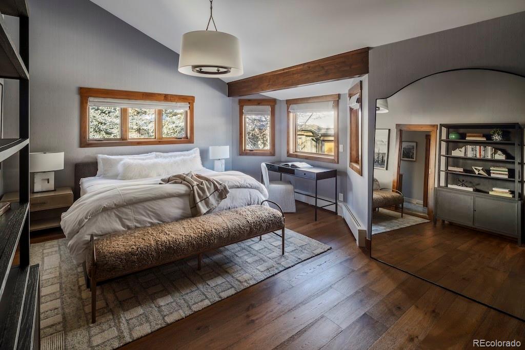 1670 Fallridge Place, Unit C11 Vail, CO 81657 - Photo 17 of 39 a bedroom with a large bed and a couch