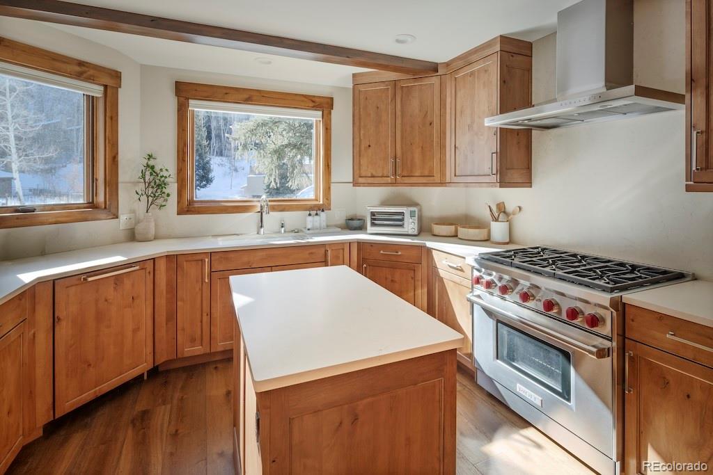 1670 Fallridge Place, Unit C11 Vail, CO 81657 - Photo 21 of 39 a kitchen with a stove a sink and a window