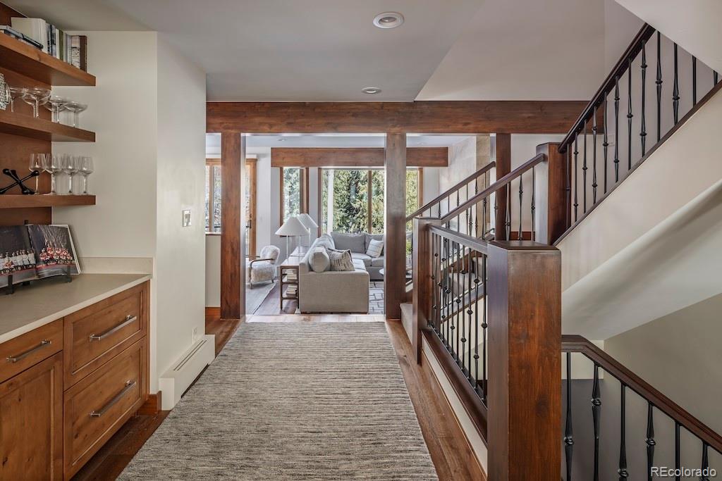 1670 Fallridge Place, Unit C11 Vail, CO 81657 - Photo 22 of 39 a view of a hallway with wooden floor and stairs