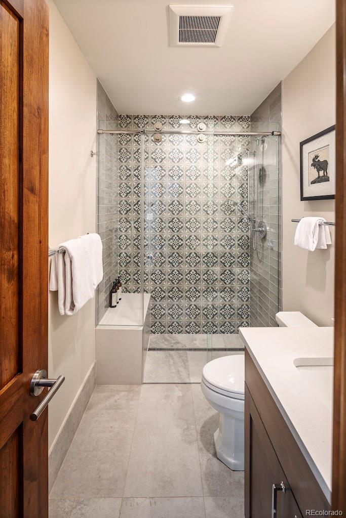 1670 Fallridge Place, Unit C11 Vail, CO 81657 - Photo 26 of 39 a bathroom with a sink toilet and shower
