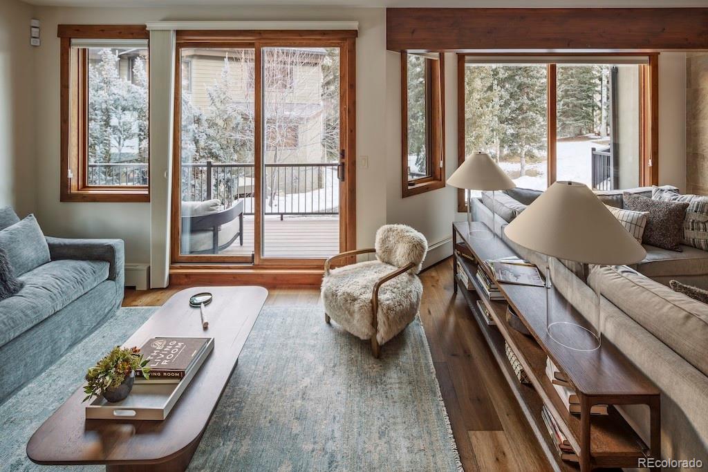 1670 Fallridge Place, Unit C11 Vail, CO 81657 - Photo 8 of 39 a living room with furniture and a large window