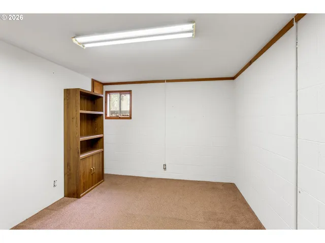 a view of a backyard of the house