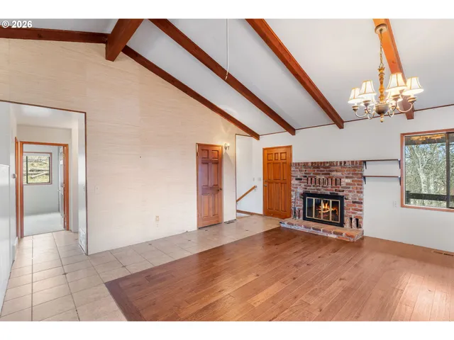 a view of a livingroom with a fireplace