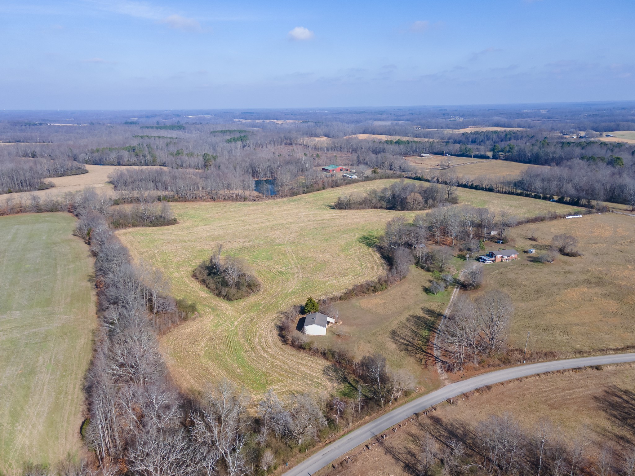 0 Jones Chapel Road Leoma, TN 38468 - Photo 4 of 14 a view of a dry yard with wooden fence