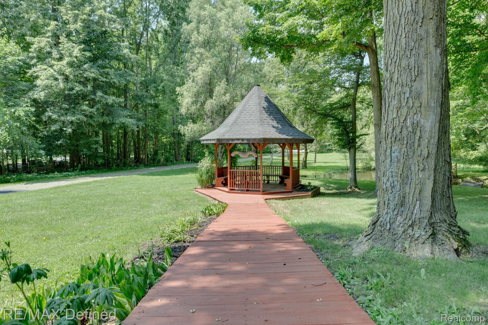 66050 Campground Road Washington, MI 48095 - Photo 4 of 31 Gazebo with wood planked walkway