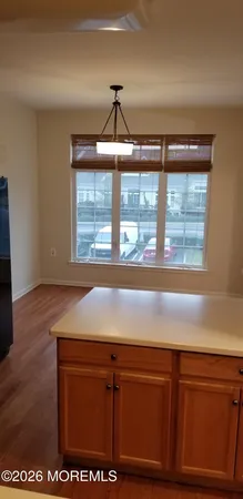 a close view of sink and cabinets