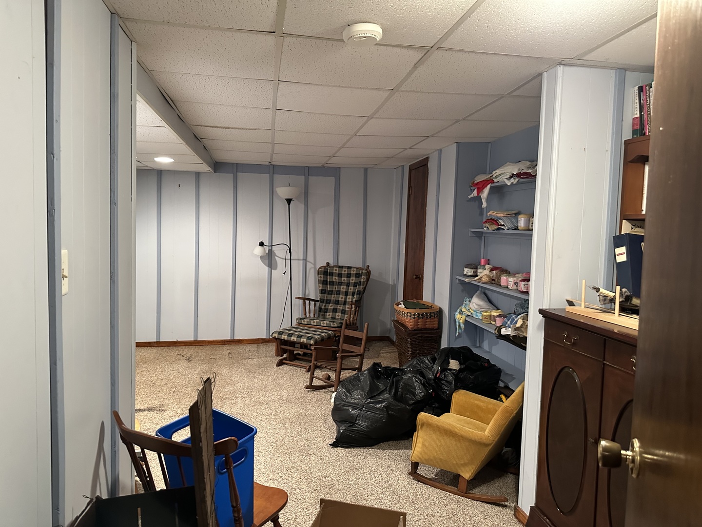 12855 Lawrence Road Sterling, IL 61081 - Photo 22 of 40 a living room with furniture and a flat screen tv