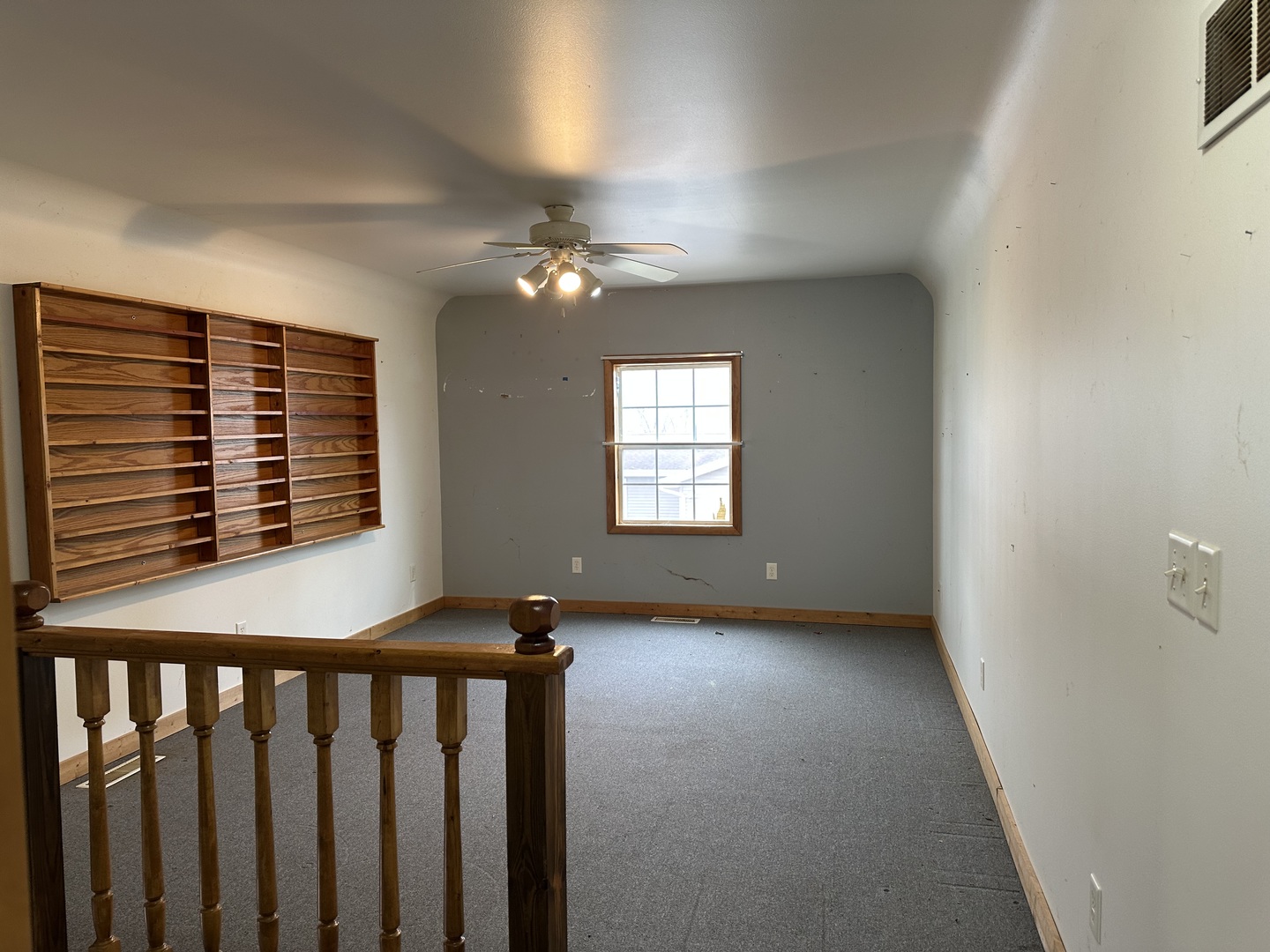 12855 Lawrence Road Sterling, IL 61081 - Photo 24 of 30 a view of a livingroom with a ceiling fan and window