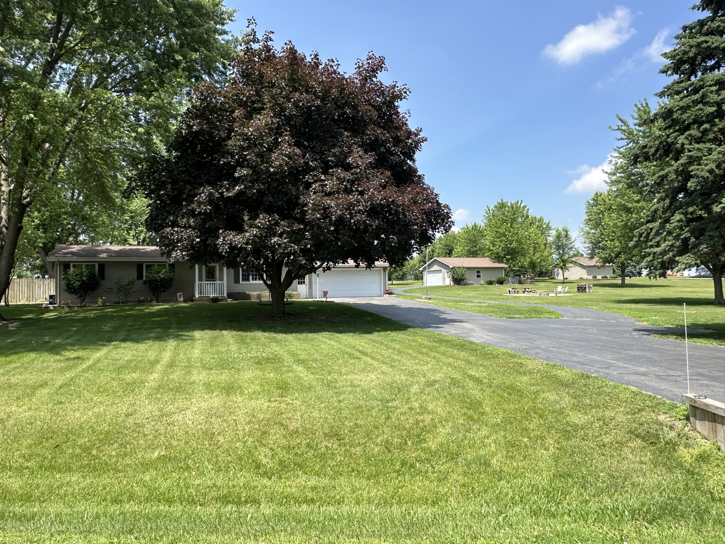 12855 Lawrence Road Sterling, IL 61081 - Photo 29 of 40 a view of a house with a big yard