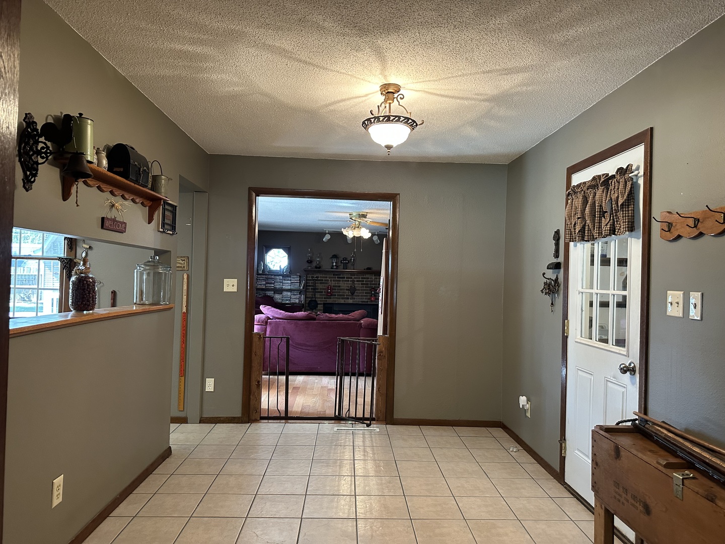 12855 Lawrence Road Sterling, IL 61081 - Photo 3 of 40 a view of a room with furniture and chandelier