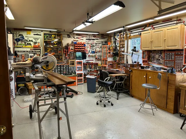 a very nice looking living room with furniture and a large window