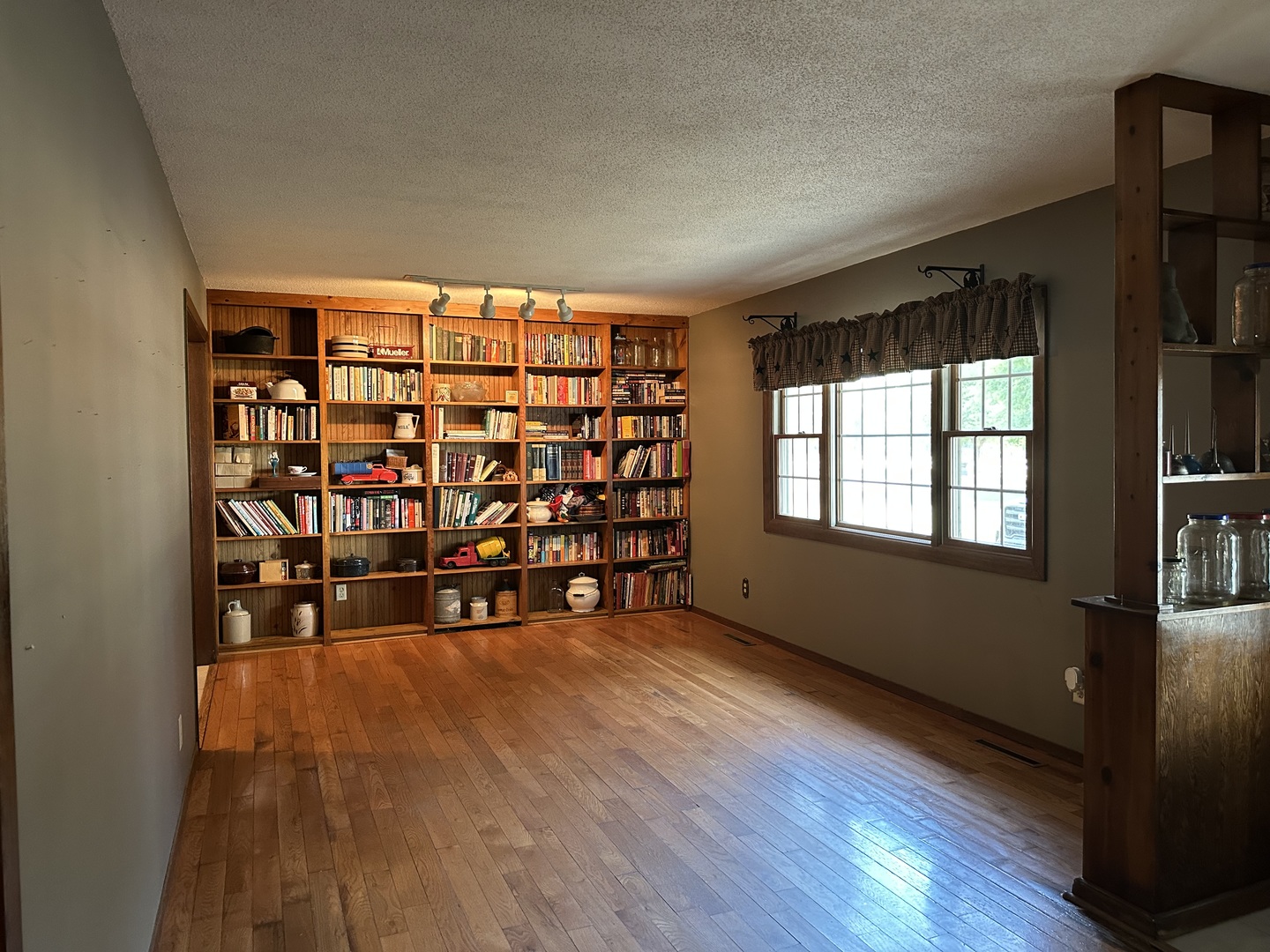 12855 Lawrence Road Sterling, IL 61081 - Photo 9 of 40 wooden floor in an empty room with a window