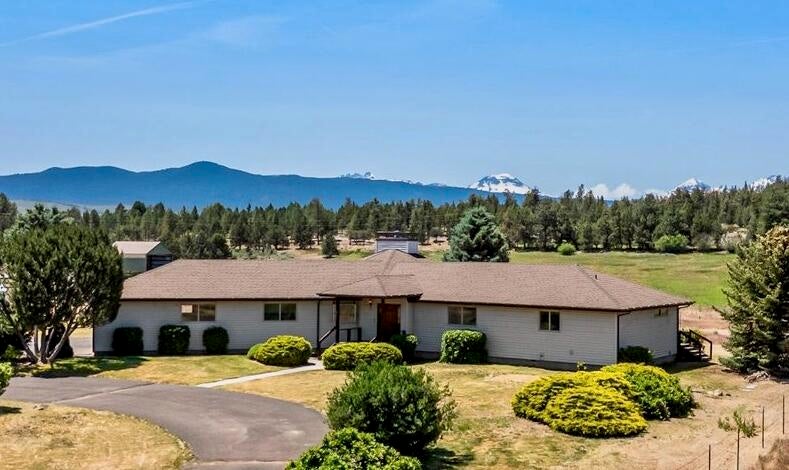 64515 Rock Springs Road Bend, OR 97703 - Photo 2 of 49 Cascade. Mountain views await you in this 4 Bed 4 Ba Home on 8.64 acres in Bend, Oregon
