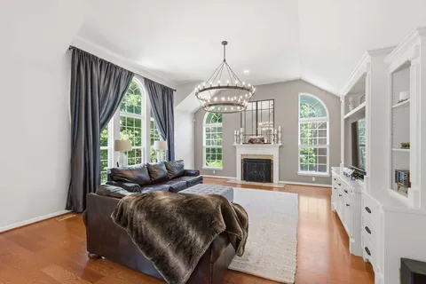 a bed room with a bed and a fireplace