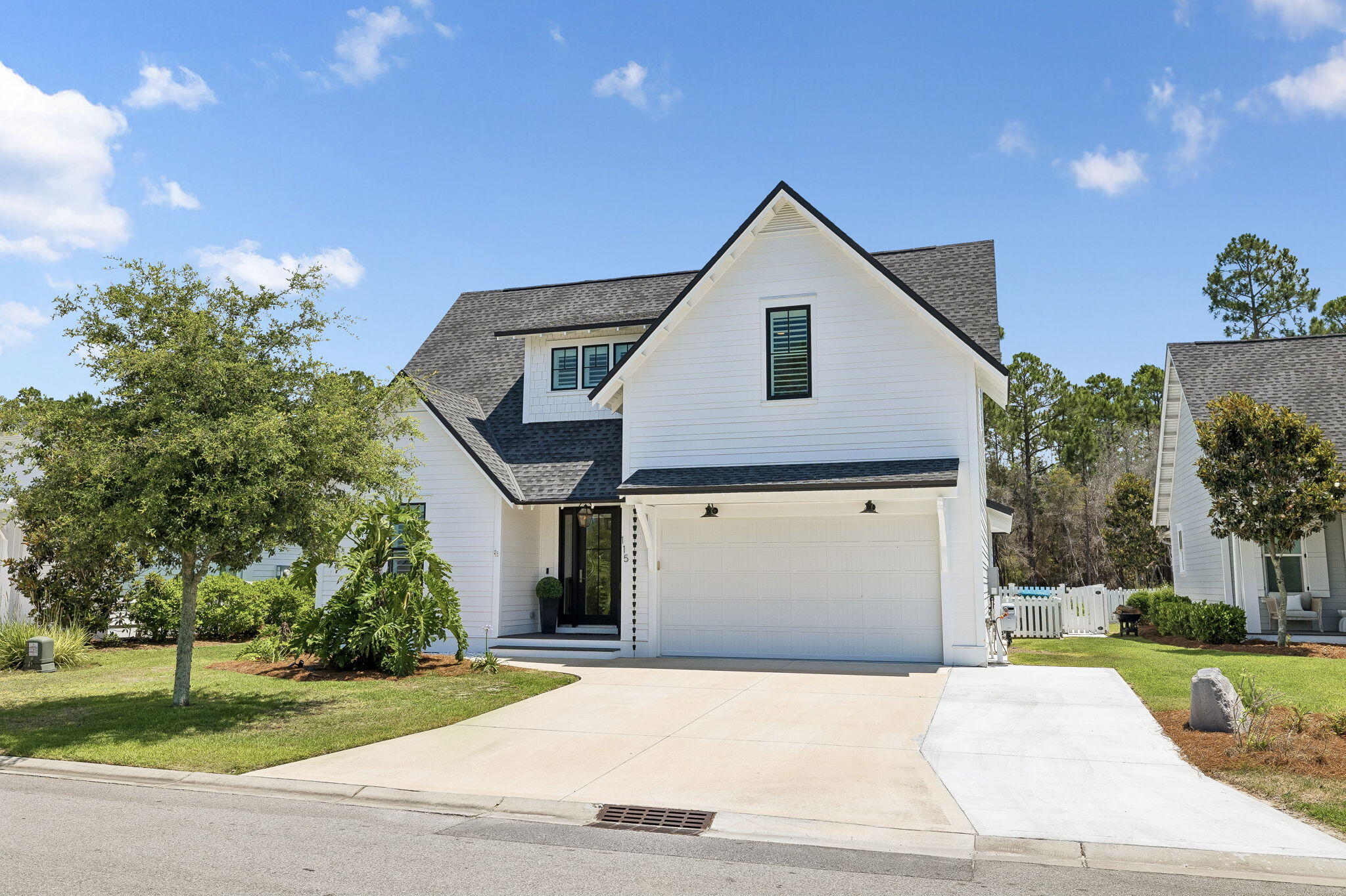 115 Log Landing St Inlet Beach Inlet Beach, FL 32461 - Photo 57 of 69 a front view of a house with a yard