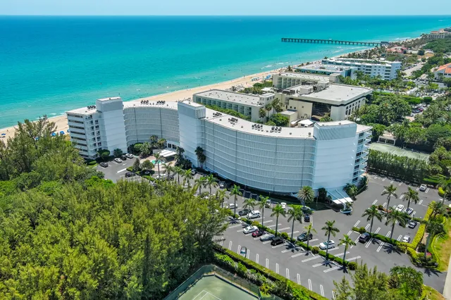 a view of a balcony with chairs