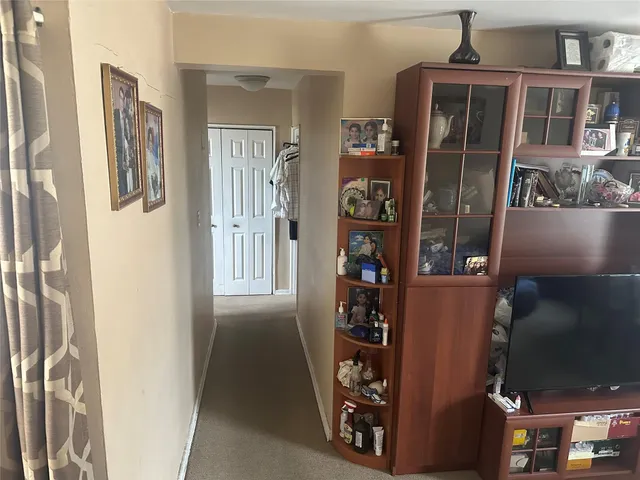 a view of a entryway with wooden floor