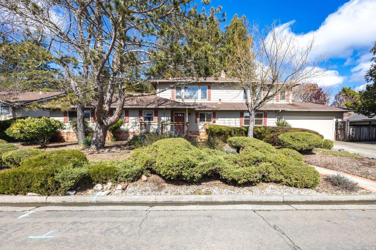 601 Buena Vista Drive Santa Rosa, CA 95404 - Photo 1 of 60 a front view of a house with a garden
