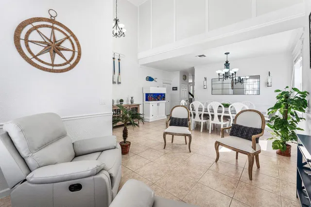 a kitchen with stainless steel appliances kitchen island granite countertop a sink and cabinets