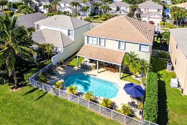a outdoor dining space with furniture and kitchen view