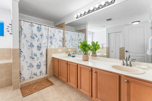 a view of a house with backyard porch and sitting area