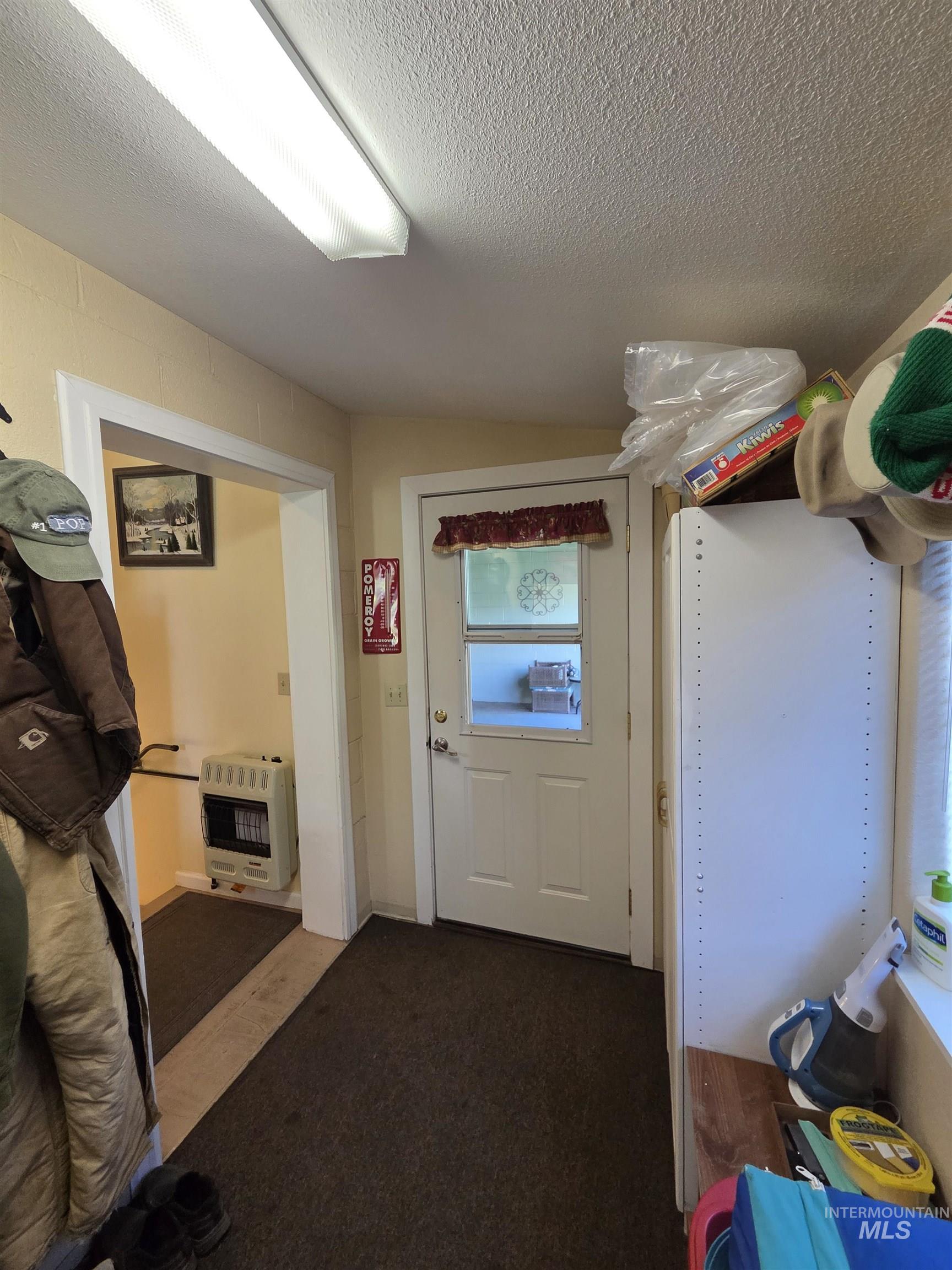 109 South 3rd Street Pomeroy, WA 99347 - Photo 19 of 36 Entryway with white door featuring a decorative glass insert