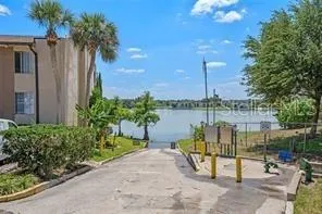a view of a lake with sitting area