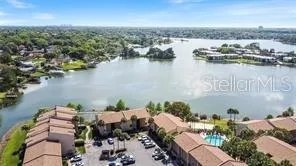 an aerial view of a city with lake view