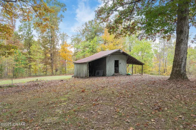 a house with trees in front of it