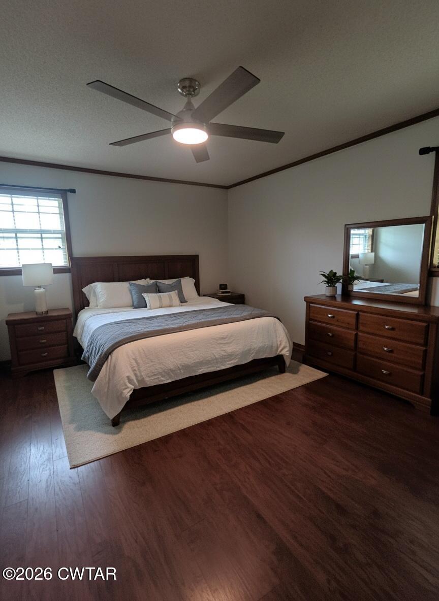 513 Viar Road Dyersburg, TN 38024 - Photo 22 of 37 a bedroom with a bed and a night stand