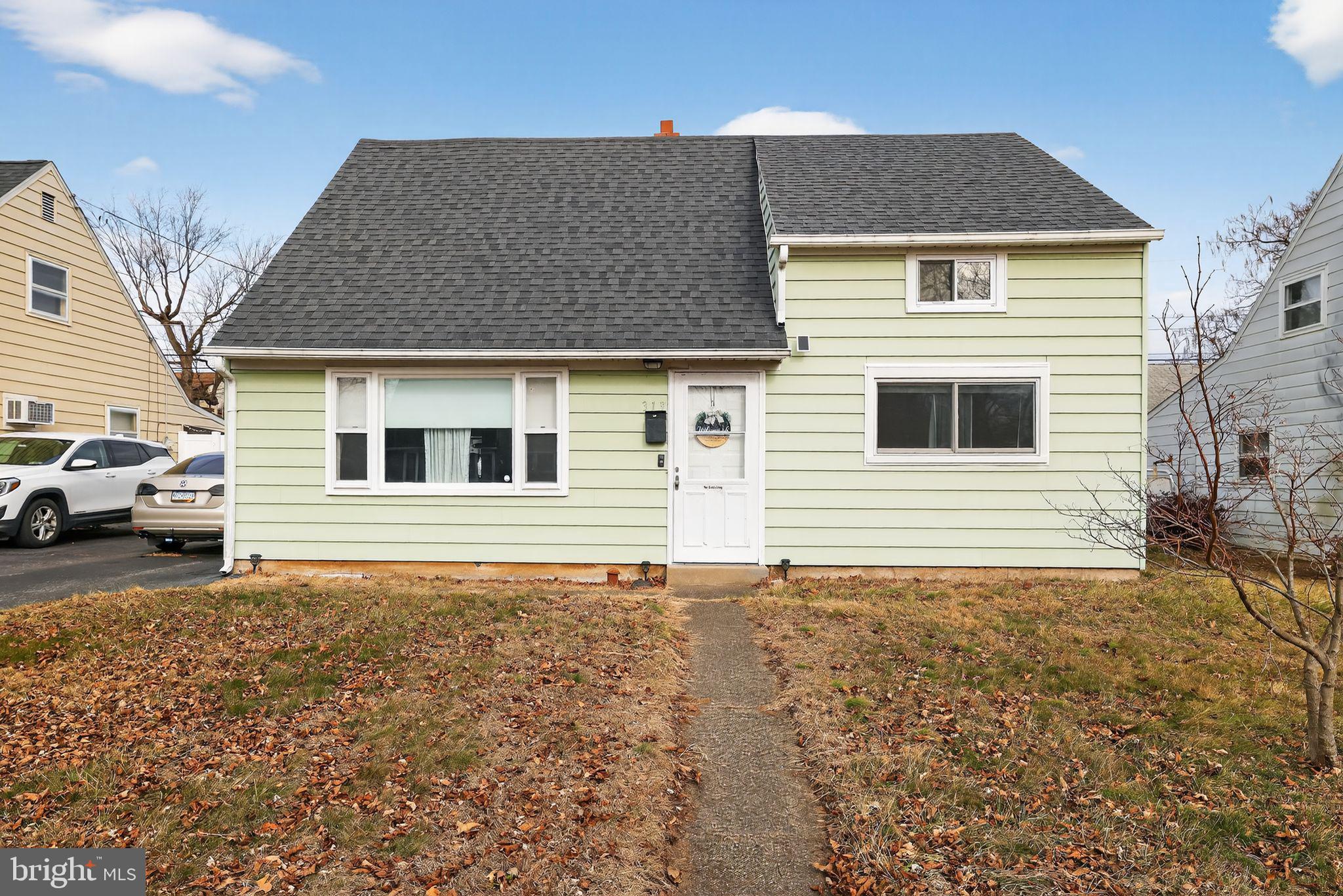 a house that has a window in front of it
