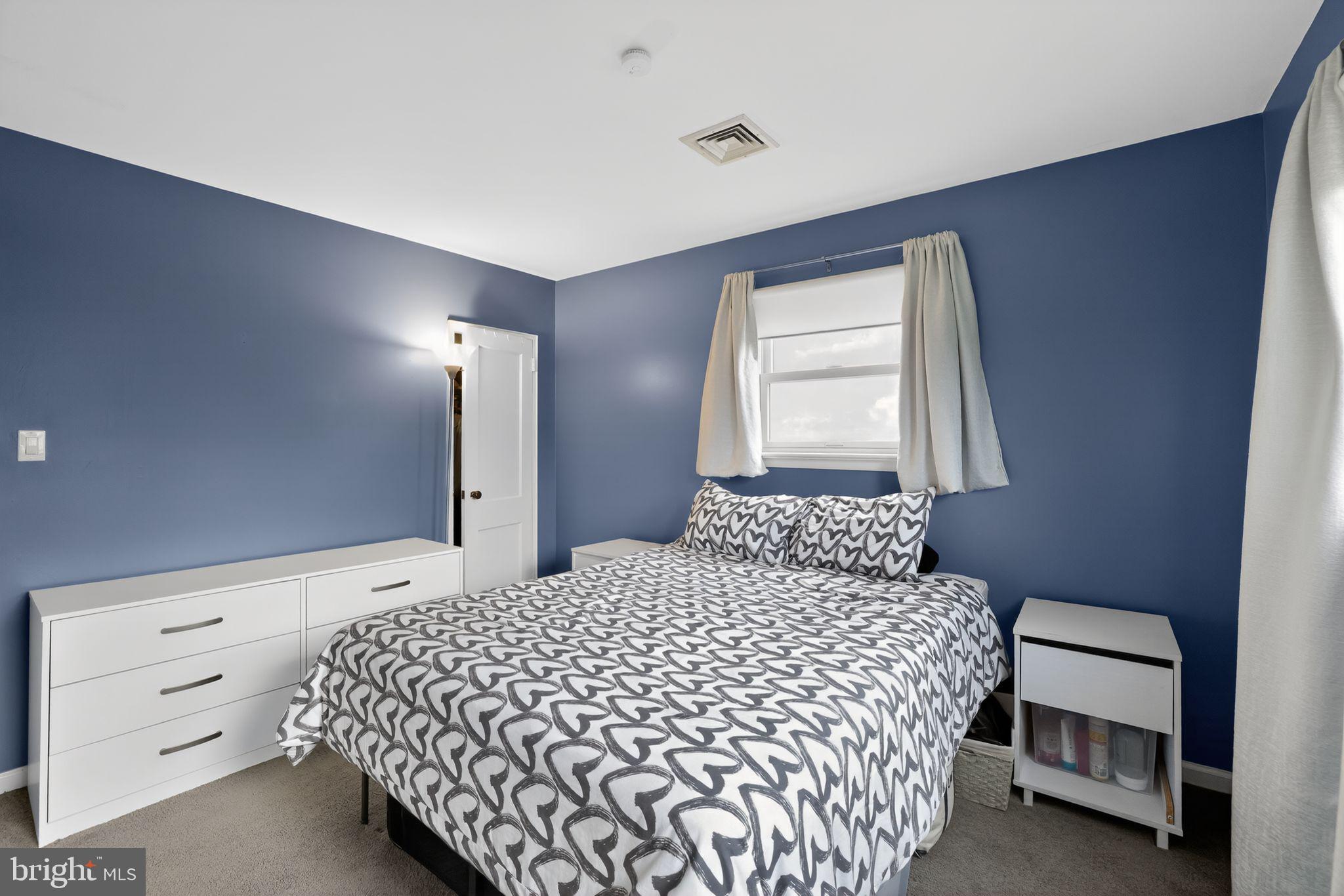 313 West Walnut Street Pottstown, PA 19464 - Photo 13 of 31 a bedroom with a bed and a window