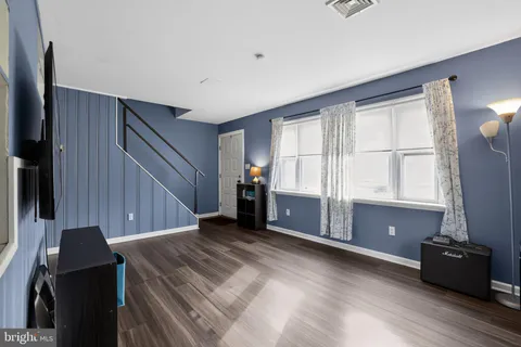 a view of a livingroom with furniture and window