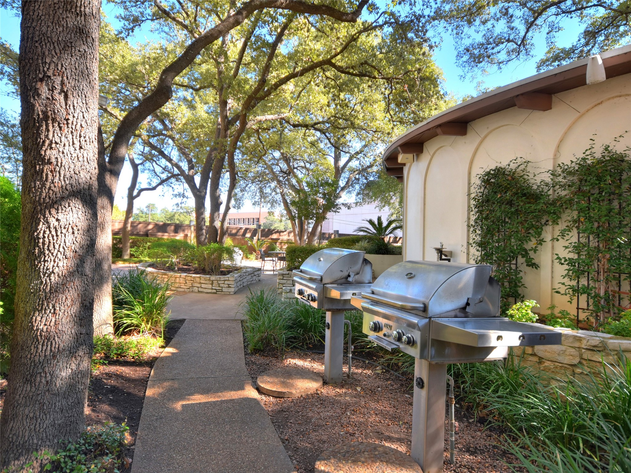 1801 Lavaca Street, Unit 2D Austin, TX 78701 - Photo 20 of 25 an outdoor view of house with backyard