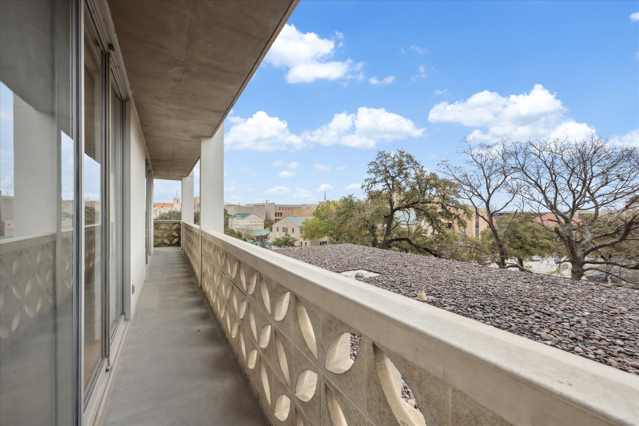 1801 Lavaca Street, Unit 2D Austin, TX 78701 - Photo 10 of 25 a view of a balcony with a yard