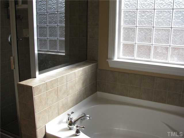 13019 Saxon Way Raleigh, NC 27613 - Photo 10 of 12 Garden tub and separate shower in master bath.