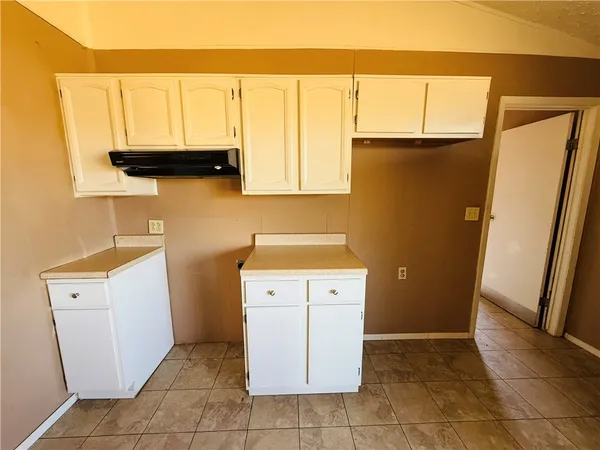 a utility room with a sink a washer and dryer