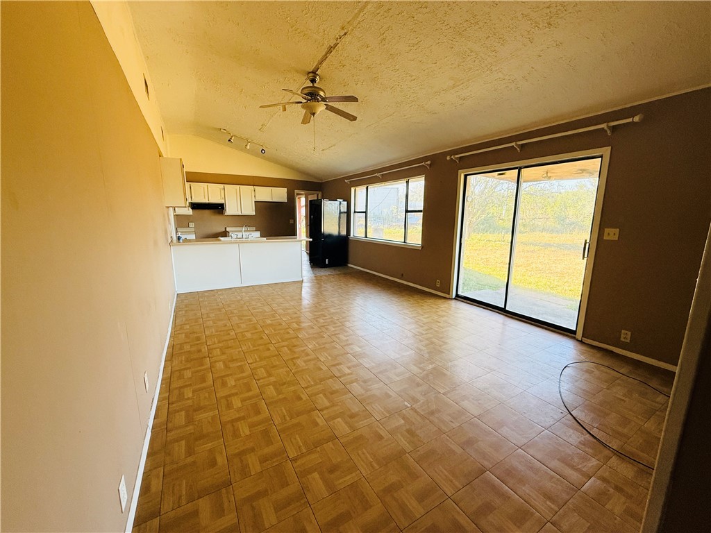2871 Carr Road Beeville, TX 78102 - Photo 19 of 35 a view of a livingroom with furniture and a ceiling fan