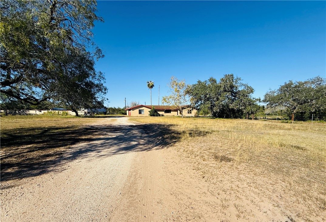 2871 Carr Road Beeville, TX 78102 - Photo 2 of 35 a view of an outdoor space and trees all around