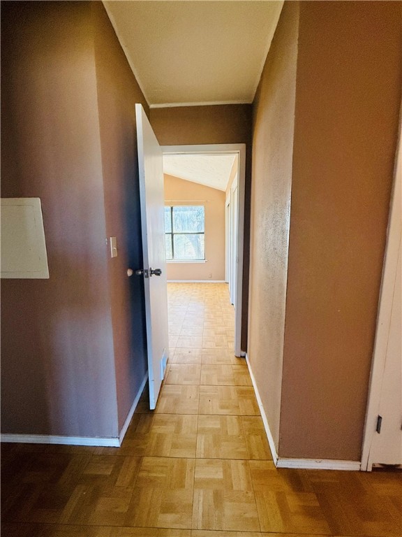 2871 Carr Road Beeville, TX 78102 - Photo 25 of 35 a view of a hallway with wooden floor and a bathroom