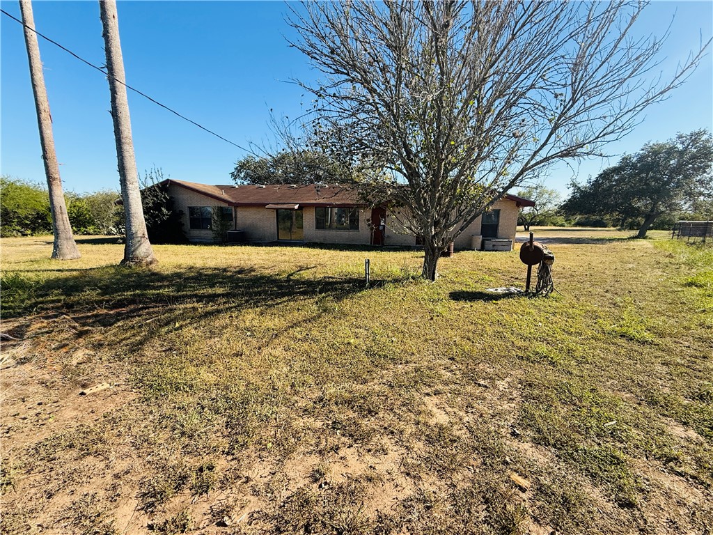 2871 Carr Road Beeville, TX 78102 - Photo 6 of 35 a view of a yard with a house