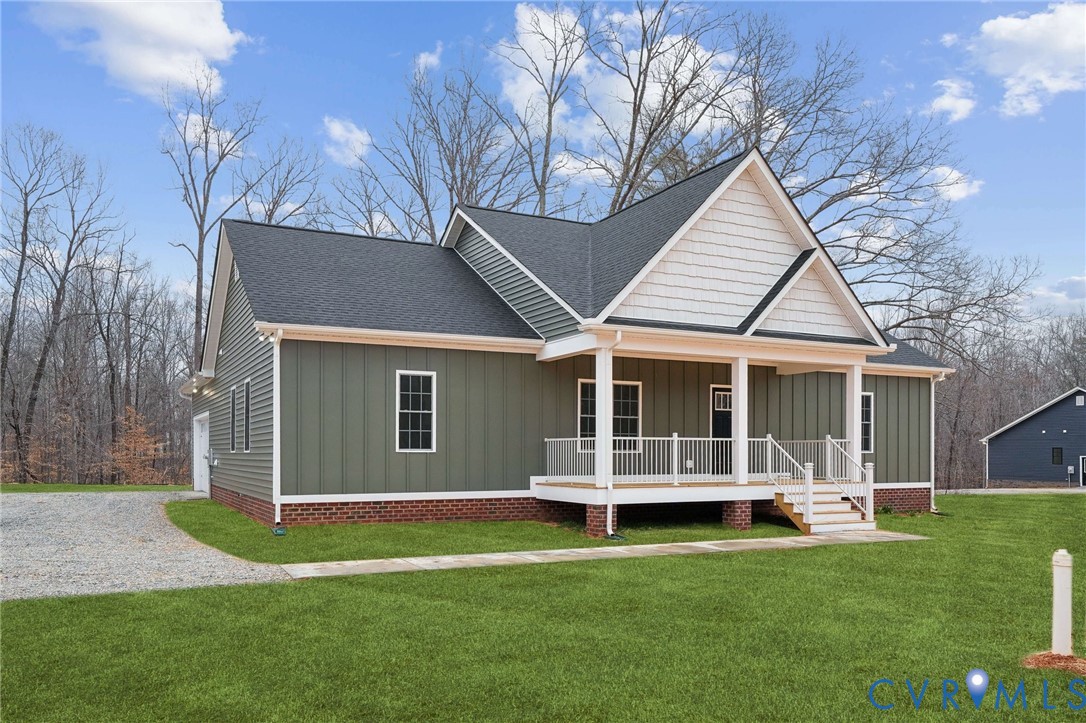 53 Oak Hill Road Cumberland, VA 23040 - Photo 2 of 37 a front view of a house with a yard