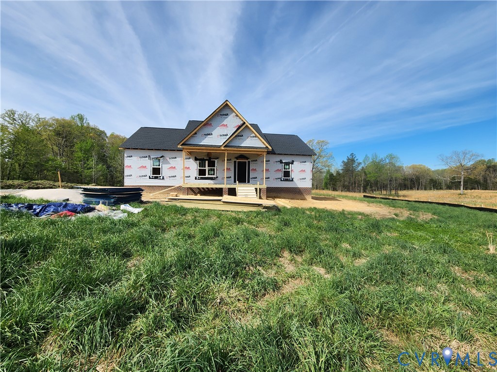 53 Oak Hill Road Cumberland, VA 23040 - Photo 3 of 37 a front view of a house with garden