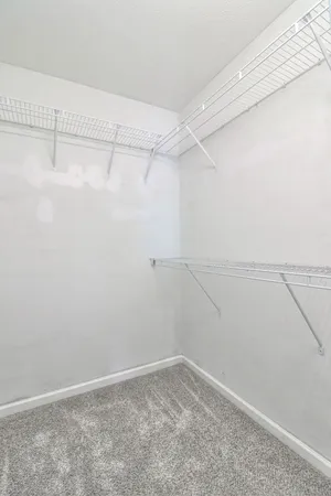 a view of a room with racks on the wall