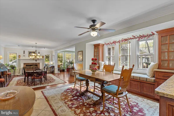 a kitchen with stainless steel appliances granite countertop a stove sink and cabinets