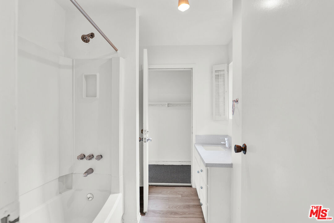 20948 Waveview Drive Topanga, CA 90290 - Photo 14 of 19 a bathroom with a bathtub and a shower