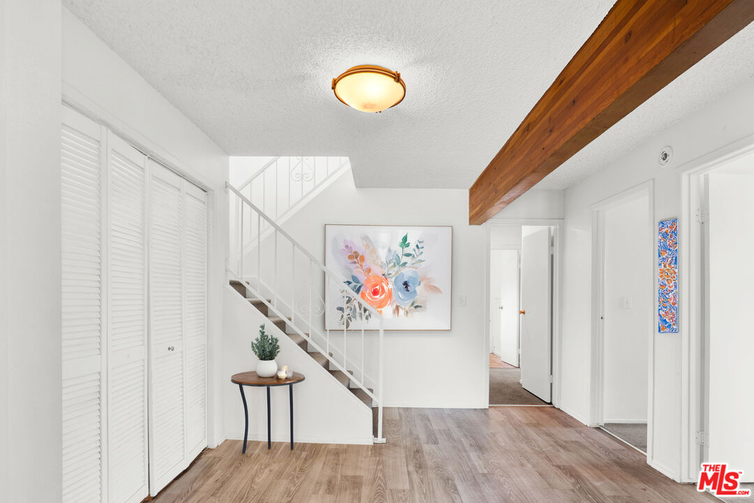 20948 Waveview Drive Topanga, CA 90290 - Photo 7 of 19 a view of entryway with wooden floor