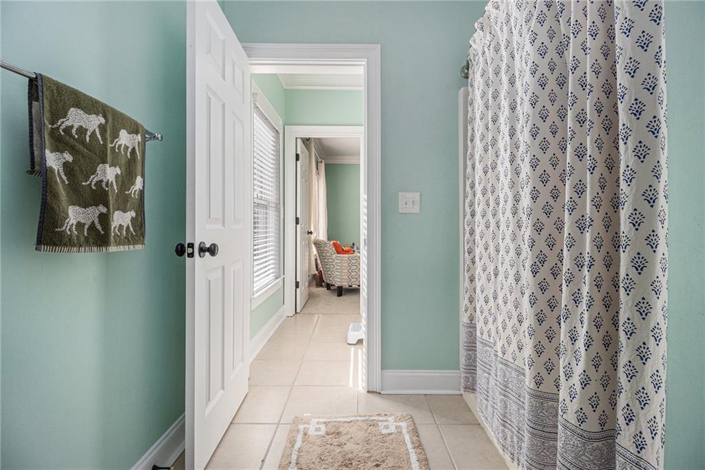 3433 Pierce Street Atlanta, GA 30337 - Photo 14 of 42 a view of a bathroom from a corridor