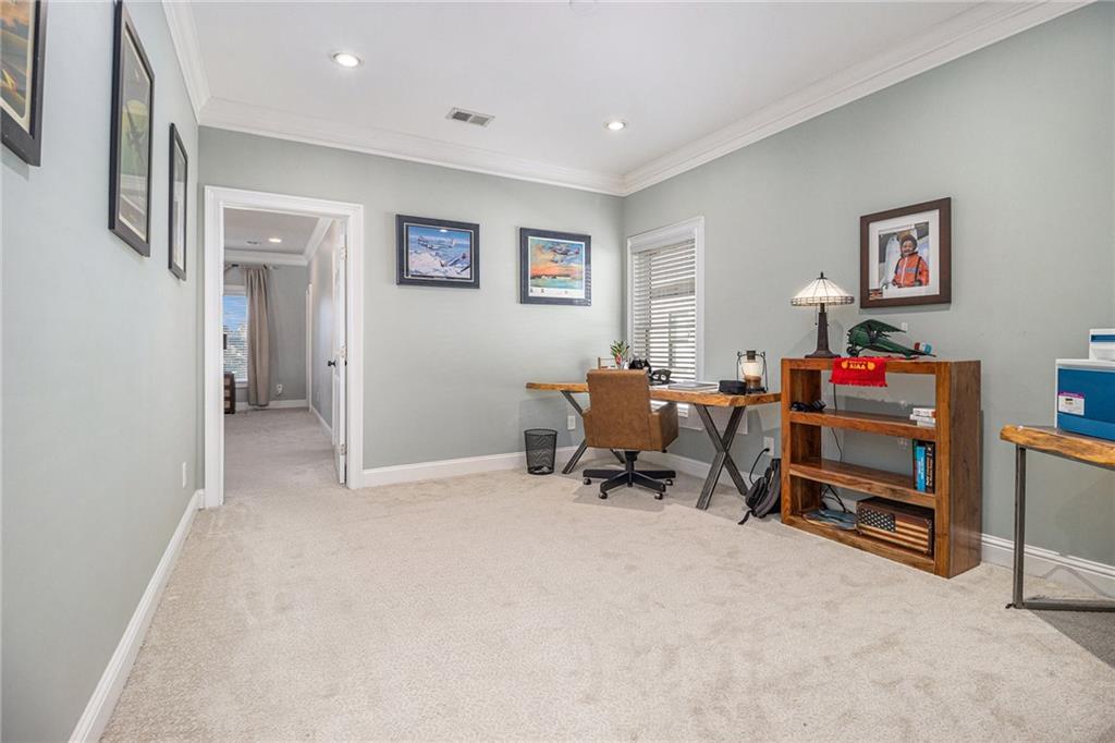 3433 Pierce Street Atlanta, GA 30337 - Photo 17 of 42 a living room with furniture and a flat screen tv