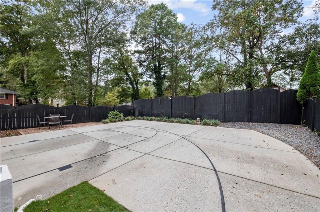 3433 Pierce Street Atlanta, GA 30337 - Photo 24 of 42 a house with a tree in front of it
